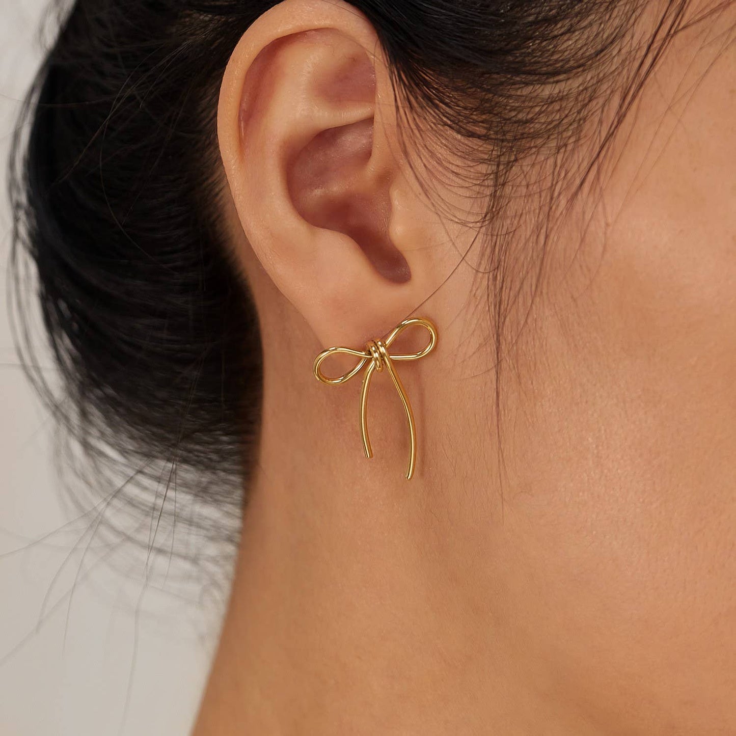JOSSLYN by wall to wall - 18K STAINLESS STEEL TARNISH FREE BOW EARRINGS | 40E0347