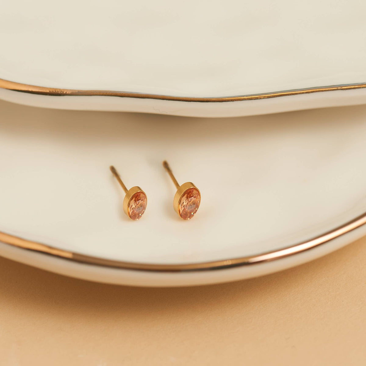 Howard's - Waterproof Earrings Oval Gem Cubic Zirconia 18K Gold Stud