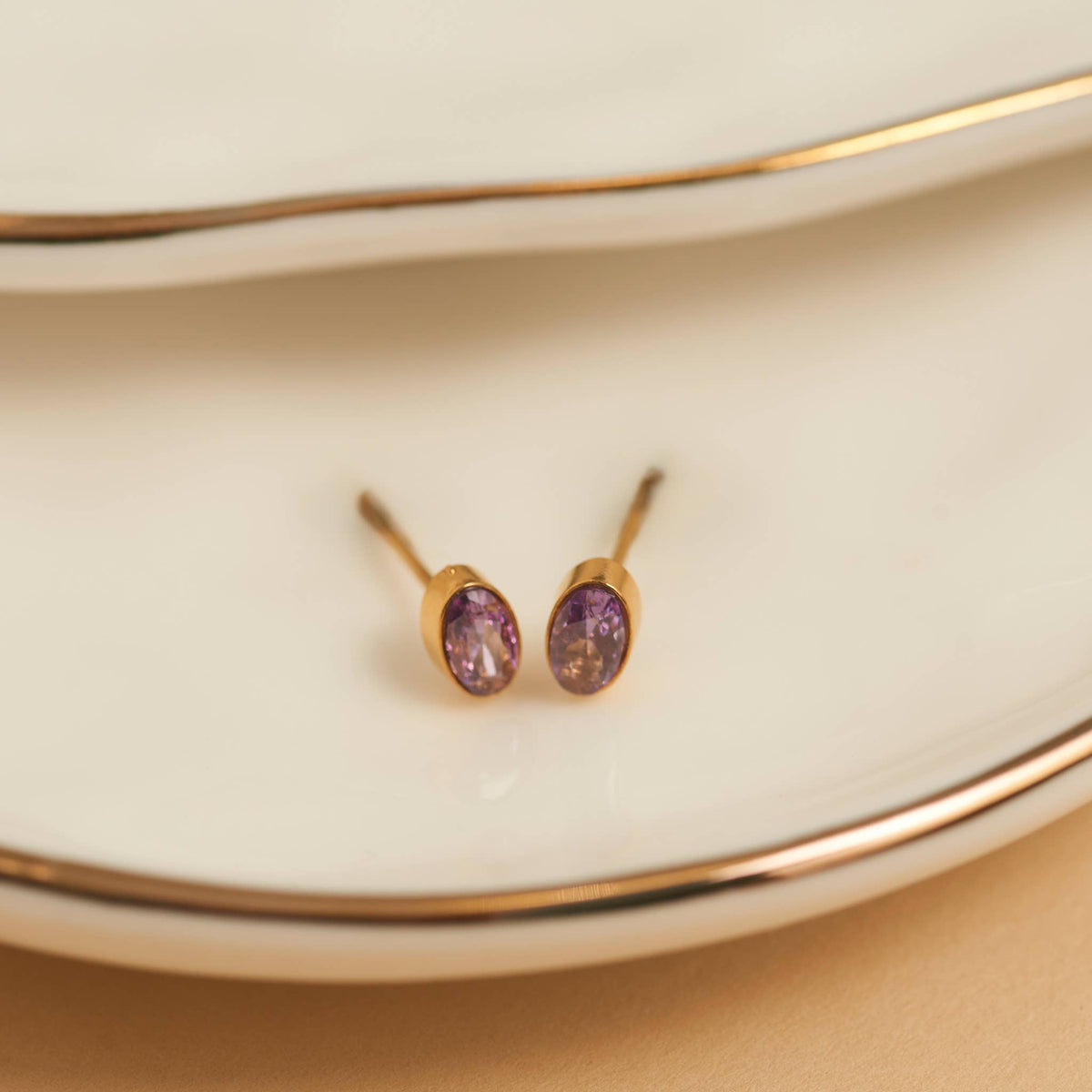 Howard's - Waterproof Earrings Oval Gem Cubic Zirconia 18K Gold Stud
